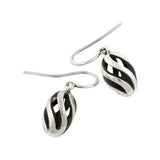 Twist and shout earrings in silver with oxidised interior by Sarah Herriot.