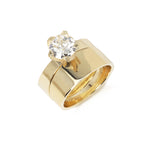 Twist collect tapered engagement ring and matching wedding band in 18ct gold with clients own round white diamond.  Twist collect ring set by Sarah Herriot.